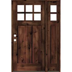 a wooden door with two sidelights