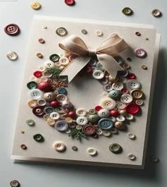 a card with buttons and a bow on it