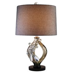 a table lamp with a brown shade on it