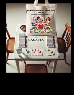 a canvas bag sitting on top of a table with cards and dices in front of it