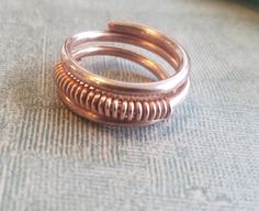 two rings sitting on top of a table