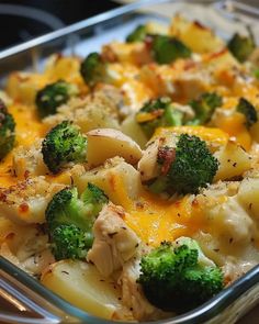 a casserole dish with chicken, broccoli and cheese