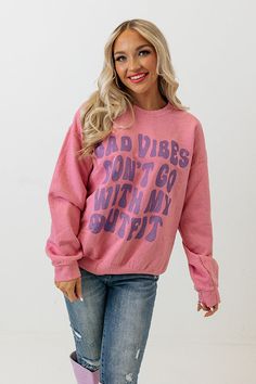 – You won't find a more cozy piece to wear  – Soft, lightweight pink material  – High round neckline  – Long, loose sleeves with fitted cuffs  – Adorable purple front lettering  – Relaxed silhouette that falls into a straight hemline                                                                                                                                           Measurements S-M :  Bust 47", Hip 42", Length 25.5", Sleeve Length 21", Waist 46".  L-XL :  Bust 49", Hip 44", Length 26.5", Sle Pink Relaxed Fit Top For Streetwear, Oversized Pink Top With Crew Neck, Trendy Pink Sweatshirt For Leisure, Trendy Comfortable Winter Tops, Trendy Comfortable Fit Tops For Winter, Trendy Winter Tops With Comfortable Fit, Pink Letter Print Sweatshirt For Loungewear, Trendy Pink Sweatshirt For Fall, Trendy Pink Fall Sweatshirt