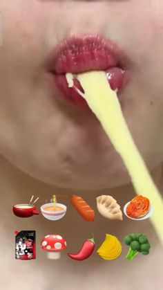 the woman is eating food with her tongue out and she has many different foods in front of her face