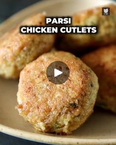 chicken cutlets on a plate with the words parsi chicken cuts in front of them