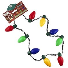 a string of christmas lights with green and red lights on it's ends,