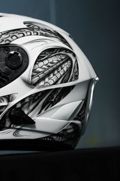 the helmet is decorated with black and white designs