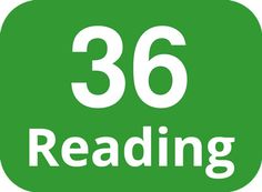 a green sign with the words reading in white