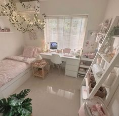 a bedroom with a bed, desk and shelves on the wall next to a window