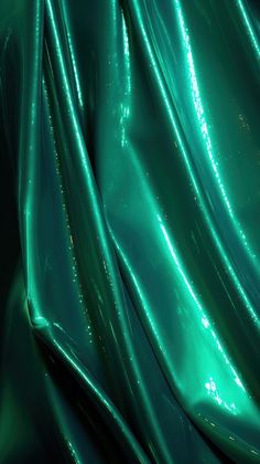 an image of shiny material that is green