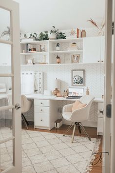 a white desk and chair in a room