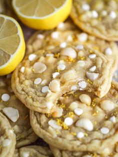 cookies with white chocolate chips and lemons on the side, ready to be eaten