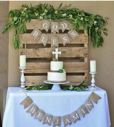 a table topped with a cake and candles