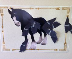 a paper cutout of a black and white horse with words written on its back