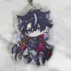 a key chain with an anime character on it