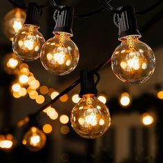 some lights that are hanging from a wire