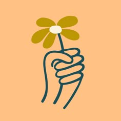 a hand holding a flower that is green and yellow