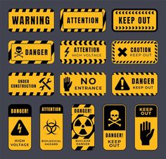 various warning signs and symbols on a gray background