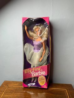 the barbie doll is in its original packaging