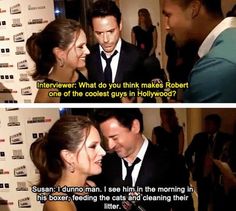 two people talking to each other in front of a red carpet with the caption'what do you think makes robert? one of the coolest guys in hollywood?