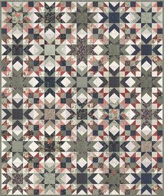 an old quilt with many different colors and patterns on the front, including red, green,