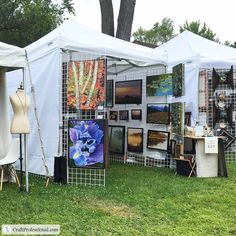 an outdoor tent with paintings on it