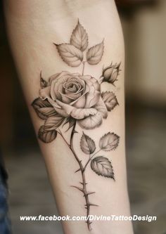 a rose tattoo on the leg