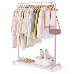 an ironing rack with clothes and shoes on it