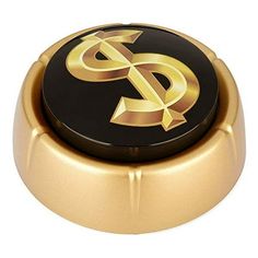 a black and gold knob with the letter s on it's center cover,