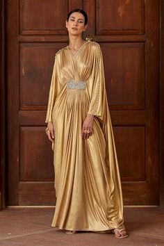 Buy Gold Lycra Embellished Glass Bead V Neck Zahra Front Draped Kaftan For Women by Dania Siddiqui Online at Aza Fashions. Draped Kaftan, Gold Drapes, Kaftan Women, Kaftan For Women, Kaftan Designs, Crystal Embroidery, Embellished Neckline, Beaded Neckline, Steam Iron