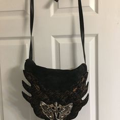 This Purse Is Gorgeous, Real Leather, Metal Angel Dark Colors And So Beautiful And Rare. This Is Only About 2 Inches In Depth, Meaning You Cannot Stuff This Purse, It's Great For Cell, Wallet, And Keys. Truly Beautiful And Rare Angel Logo, Angels Logo, Logo Color, Dark Colors, Leather Handbag, Real Leather, Bag Sale, Leather Handbags, Black Silver