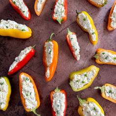 stuffed mini peppers on a baking sheet with the words stuffed mini peppers written above them