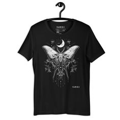 Luna Deaths Head Moth Tshirt - UNISEX FIT Welcome to KAMIOJI - Your Destination for All Things Weird & Wonderful! Embrace your unique style with our extraordinary collection of clothing. Our designs, featuring elements of Gothic, Witchy, Occult, Alternative, and Anime aesthetics, are brought to life with precision using the latest DTG printing technology. With sizes ranging from XSM to 5XL on select colors, we cater to all body types and preferences. Whether you're a fan of the dark and mysterio Moth Tshirt, Deaths Head, Alt Clothing, Deaths Head Moth, Dark Cottagecore, Luna Moth, Common Questions, Dtg Printing, Body Types