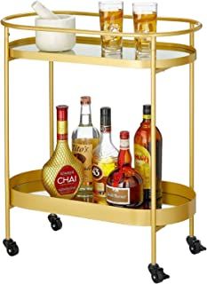 a gold bar cart with drinks on it