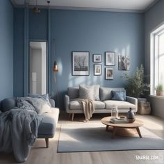 a living room with blue walls and white furniture in the center, along with pictures on the wall