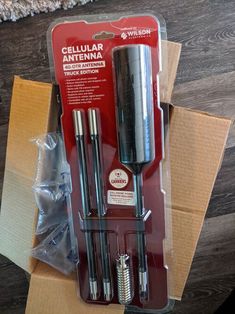 two screwdrivers are sitting in a box