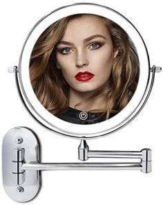 a close up of a mirror with a woman's face in the center and red lipstick on it