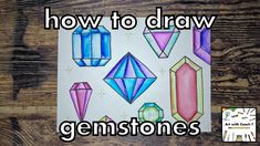 how to draw gemstones with colored pencils and watercolor paper on wooden background