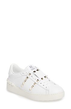 Goldtone pyramid studs add a flash of signature glamour to a lace-up sneaker that instantly elevates your street-style game. Style Name:Valentino Garavani Rockstud Sneaker (Women). Style Number: 5142148. Available in stores. Valentino Shoes Outfit, Valentino Rockstud Sneakers, Valentino Sneakers, Shoe Wishlist, White Sneakers Women, Valentino Rockstud, Valentino Shoes, Dream Shoes, Designer Sneakers