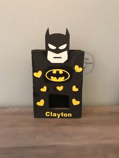 a cardboard box that has a batman on it