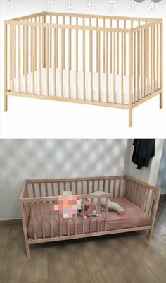 the baby crib is made from wood and has pink sheets