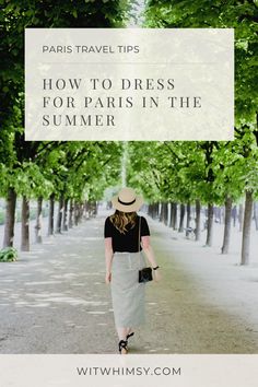 a woman walking down the street with trees in the background and text overlay that reads paris travel tips how to dress for paris in the summer