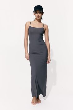 Long  fitted dress in ribbed jersey. Narrow shoulder straps  low-cut  rounded neckline  and a straight-cut hem. Long Fitted Dress, Long Fitted Dresses, Long Slip Dress, Long Slip, Summer Bodycon Dress, Ribbed Bodycon Dress, Glam Look, Dress 2024, Cardigan Sweater Dress