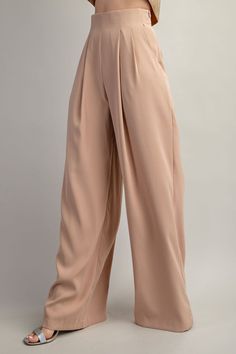 Pleated High Waist Wide Pants Brand: Glam Style: GP6389 Fabric: 100%POLYESTER Details: SS24 Pleated High Waist Wide PantsMODEL HEIGHT 5'7" Made in China Luxury Pleated Hem Bottoms For Fall, Luxury Wide-leg Pants With Pleated Waist, Luxury Tie Waist Pants For Spring, Luxury Wrap Bottoms For Women, Luxury Formal Wide Leg Viscose Pants, Luxury Pleated Full-length Bottoms, Luxury Wide Leg Pull-on Pants, Luxury Pleated Waist Pants, Glam Style