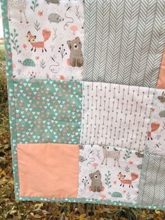 a patchwork quilt with animals on it