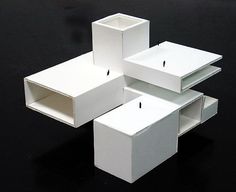 several white boxes stacked on top of each other