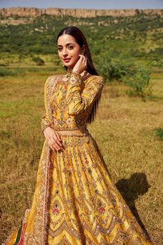 The Bridal Wedding Dress in Yellow Lehenga Choli Style is an Embellished masterpiece adorned with Goldwork and Mirror details. Custom sizes. Fast shipping. Gold Anarkali Set With Traditional Drape, Gold Dupatta For Reception And Festivals, Gold Embroidered Sharara For Festivals, Gold Sharara With Gold Embroidery For Festivals, Festival Gold Sharara With Gold Embroidery, Gold Lehenga With Dupatta In Raw Silk, Gold Raw Silk Lehenga With Dupatta, Gold Lehenga With Dupatta For Reception, Gold Choli With Dupatta For Reception