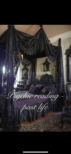 an ornate bed with purple sheets and black drapes on the headboard is shown