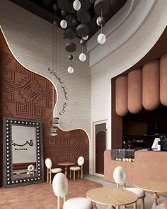 the interior of a restaurant with tables and chairs