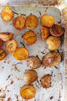 baked potatoes on a baking sheet ready to be eaten